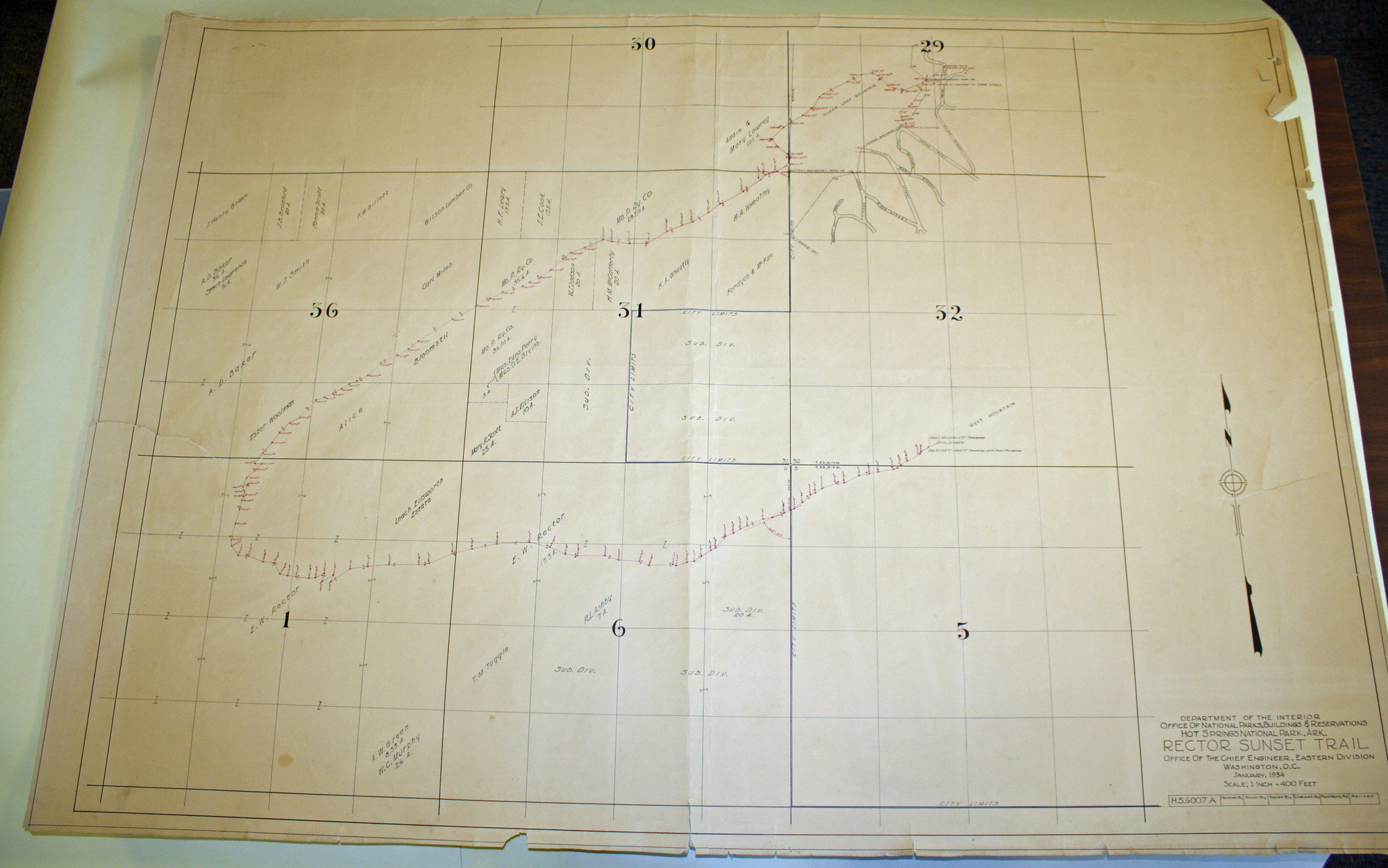 Map of Rector Sunset Trail, January 1934. Sections 29-32, 36, 1, 6, and 5. West Mountain and Sugerloaf Mountain. Paper. Sunset Trail depicted in red against plats in black lines.