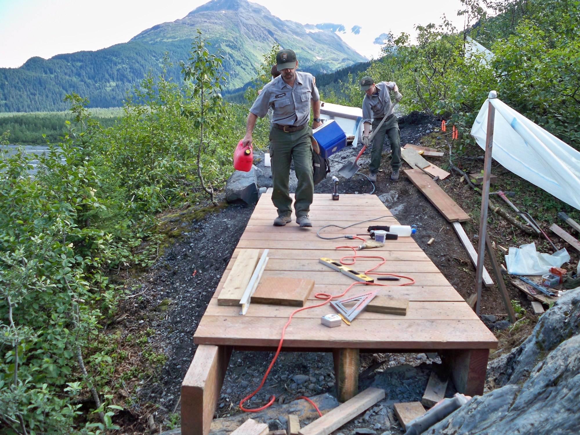 Maintenance workers replace the bridge along the Edge of Glacier Trail at Exit Glacier, 2009.