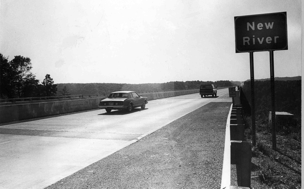 Cars crossing bridge