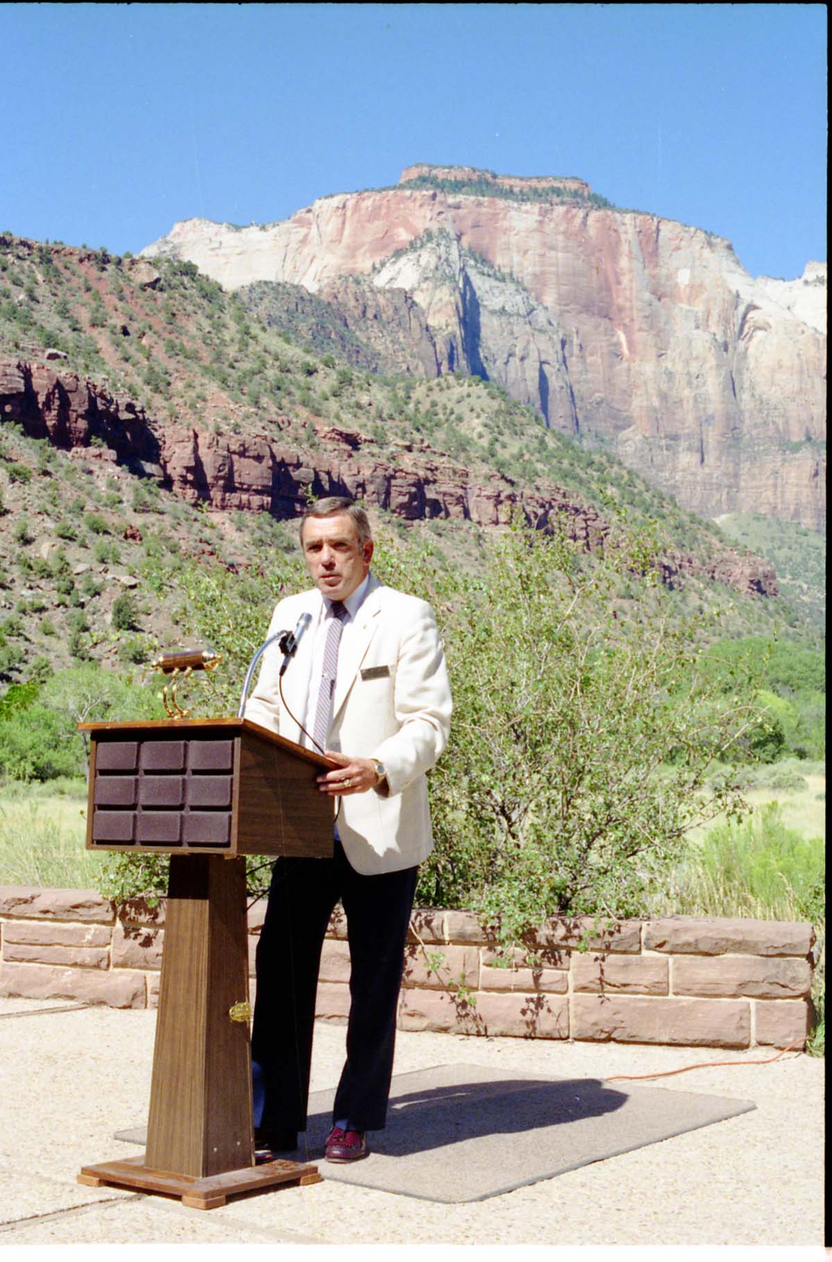 Color Photos of the parks 72nd anniversary celebrations- cake cutting, barbecue, speakers.