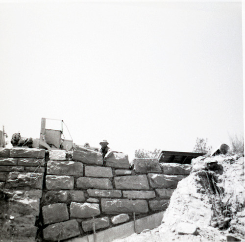 Brick retaining wall along East Rim road during repairs.