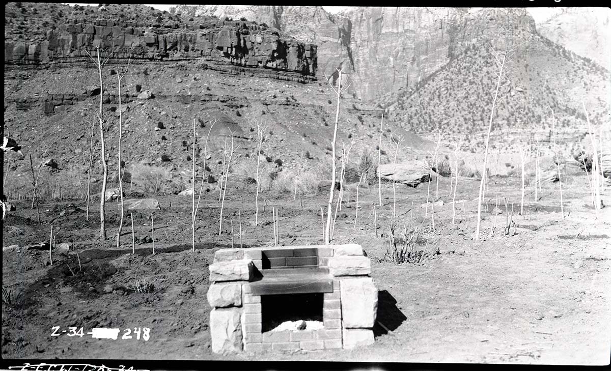 Stone and brick fireplace in South Campground.