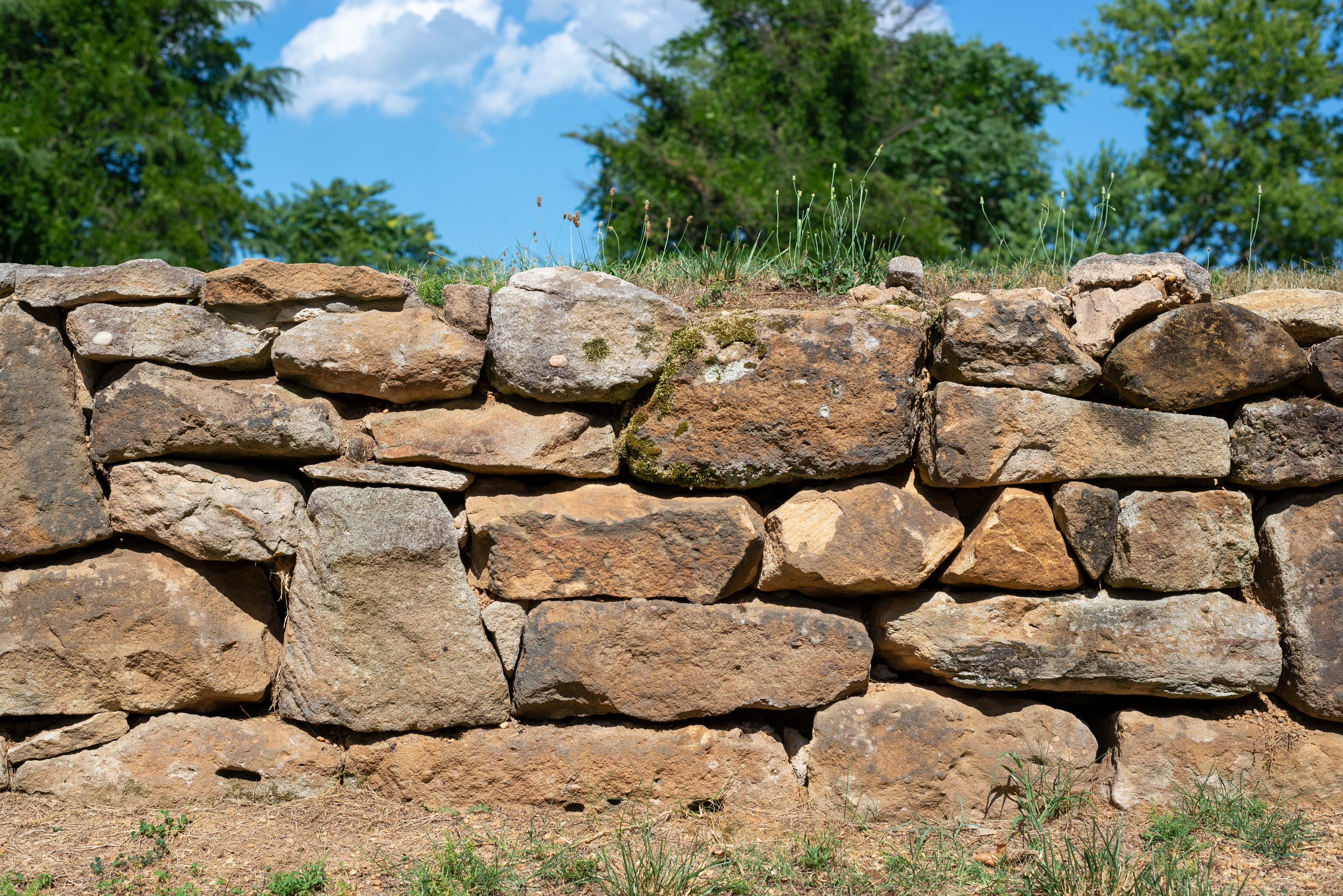A stone wall showing wear of time