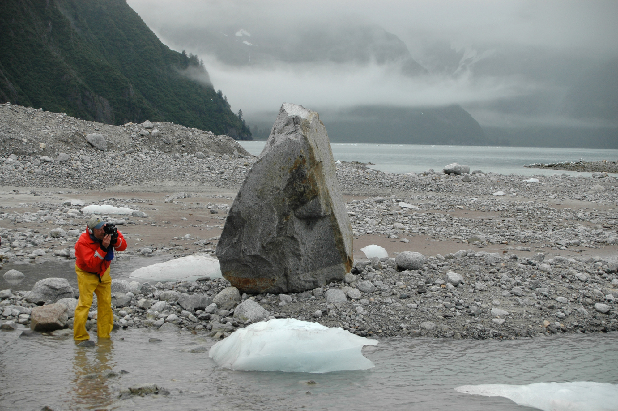 Person photographs from shore full of ice chunks 2005