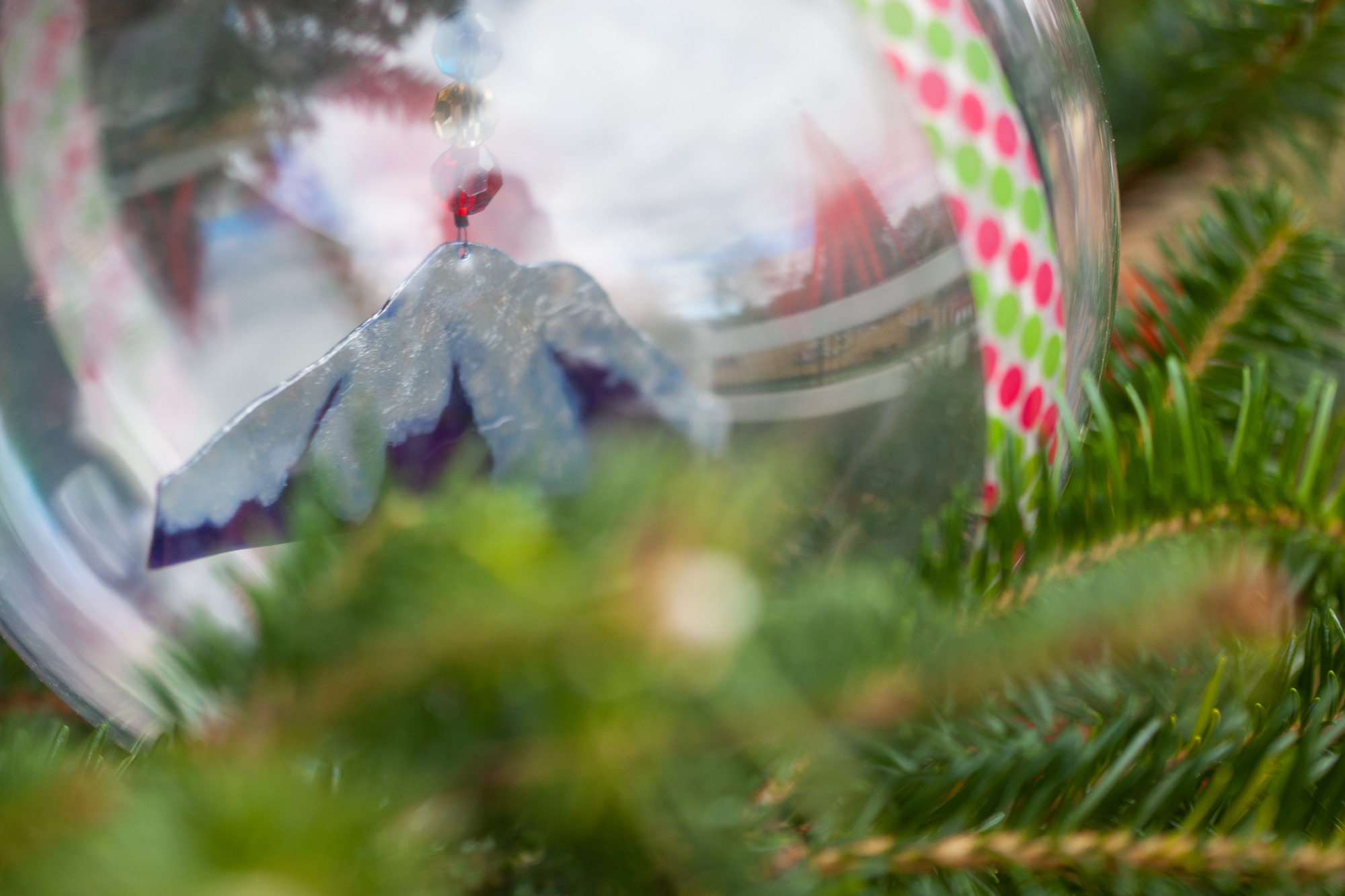 A snow capped mountain painted inside of a glass ornament from Washington State.