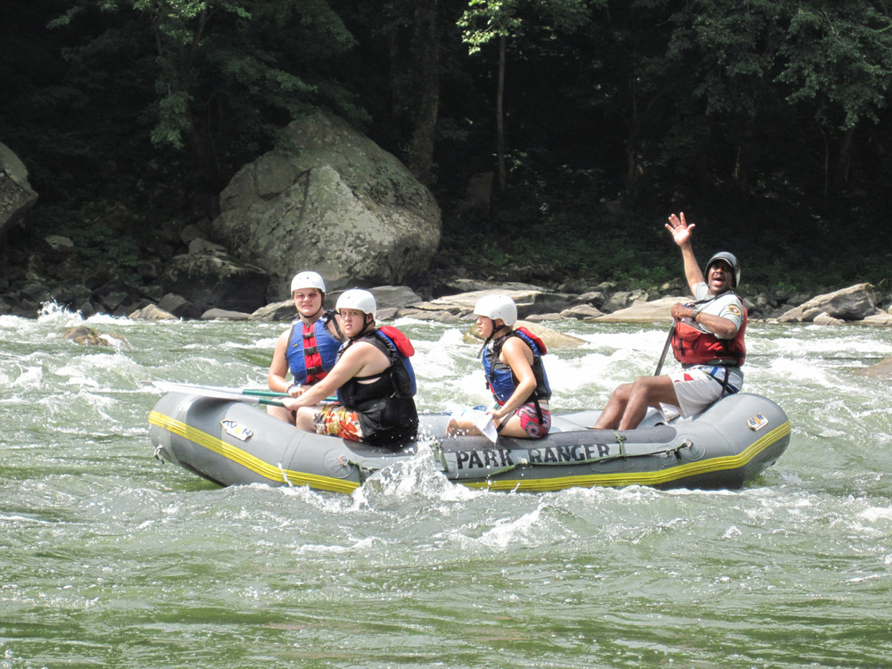 whitewater rafters on the river