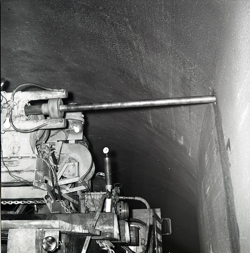 Machinery, crews drilling test cores in Zion-Mt. Carmel tunnel.