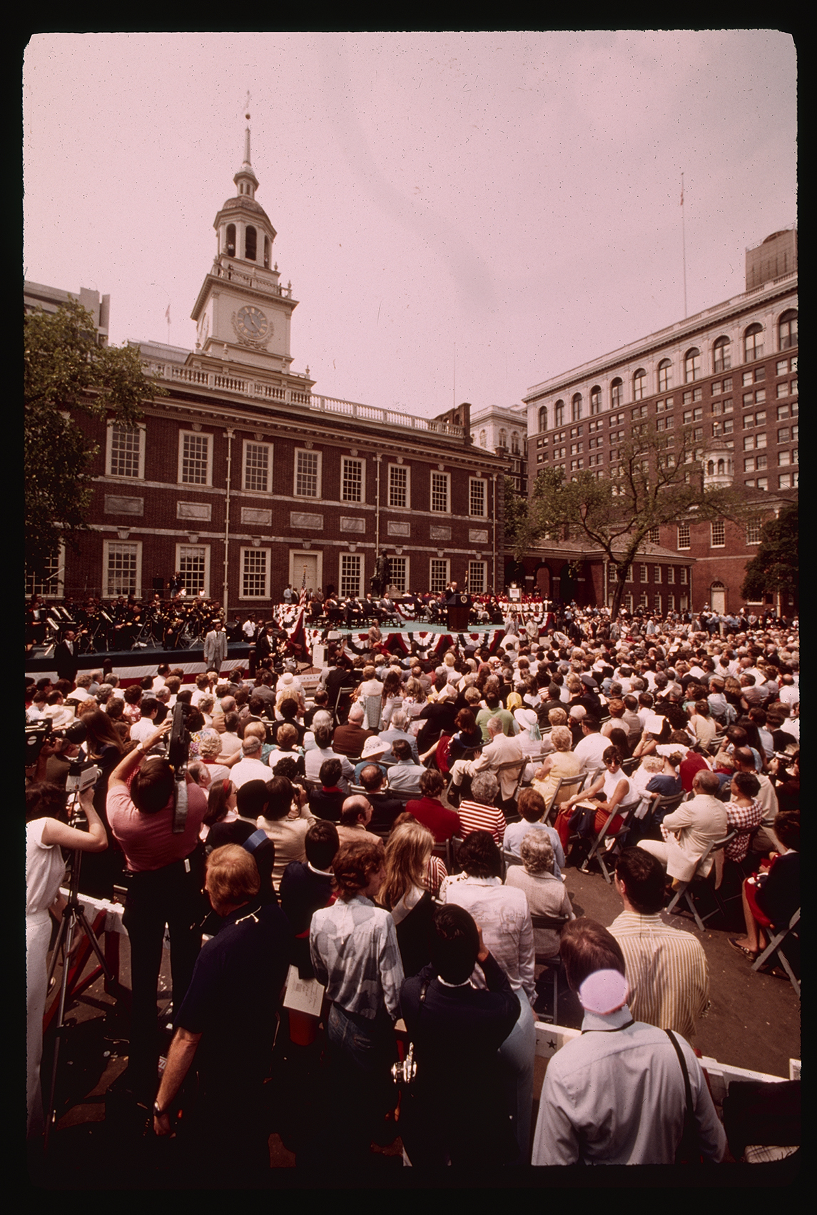 Independence Hall. President Gerald Ford's visit during the Bicentennial. Looking north across Chestnut Street. Tower clock, 11:20 AM.