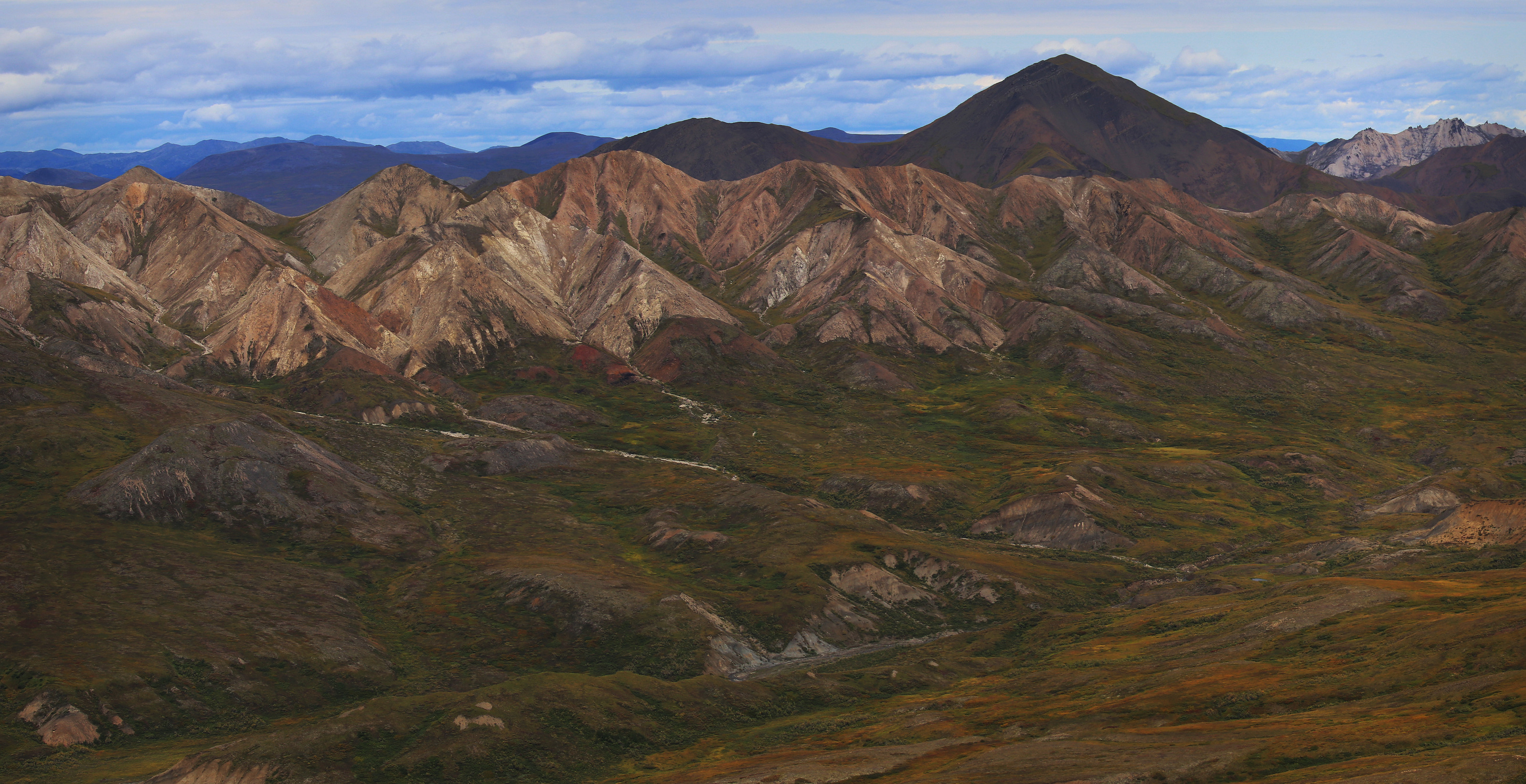 landscape of steep hills and mountains