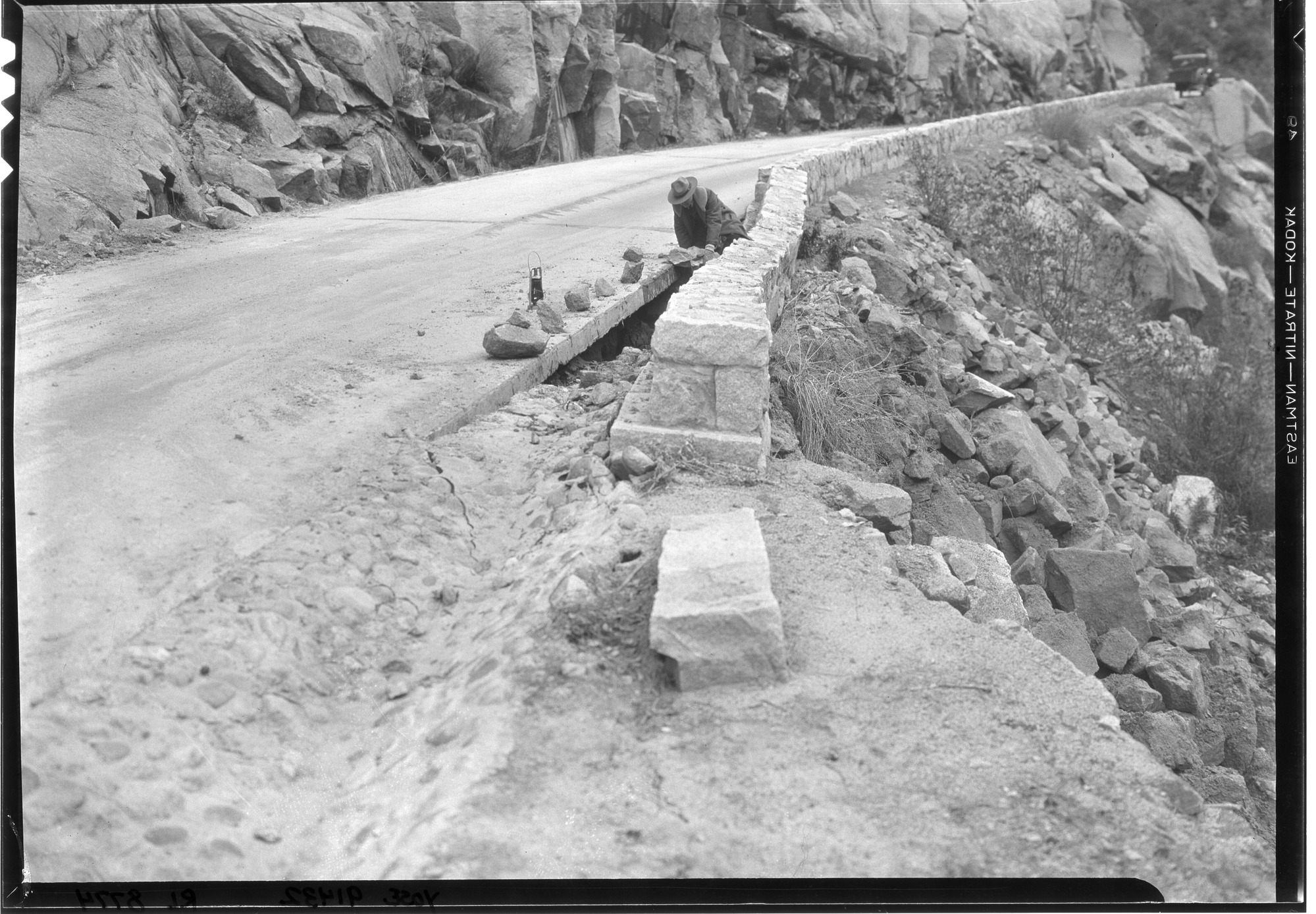 Wall Broken on All Year Hwy. below Arch Rock