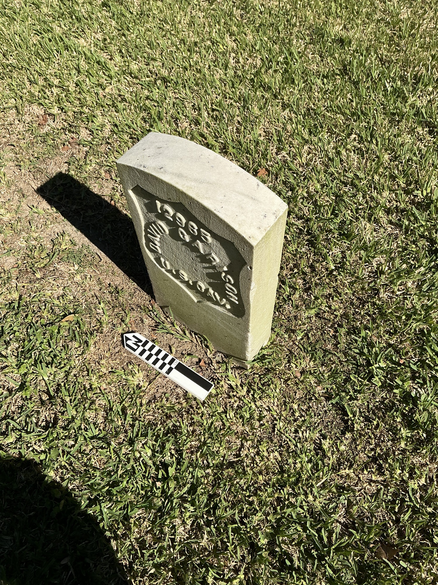 Extra image of historic upright marble headstone with recessed shield face.