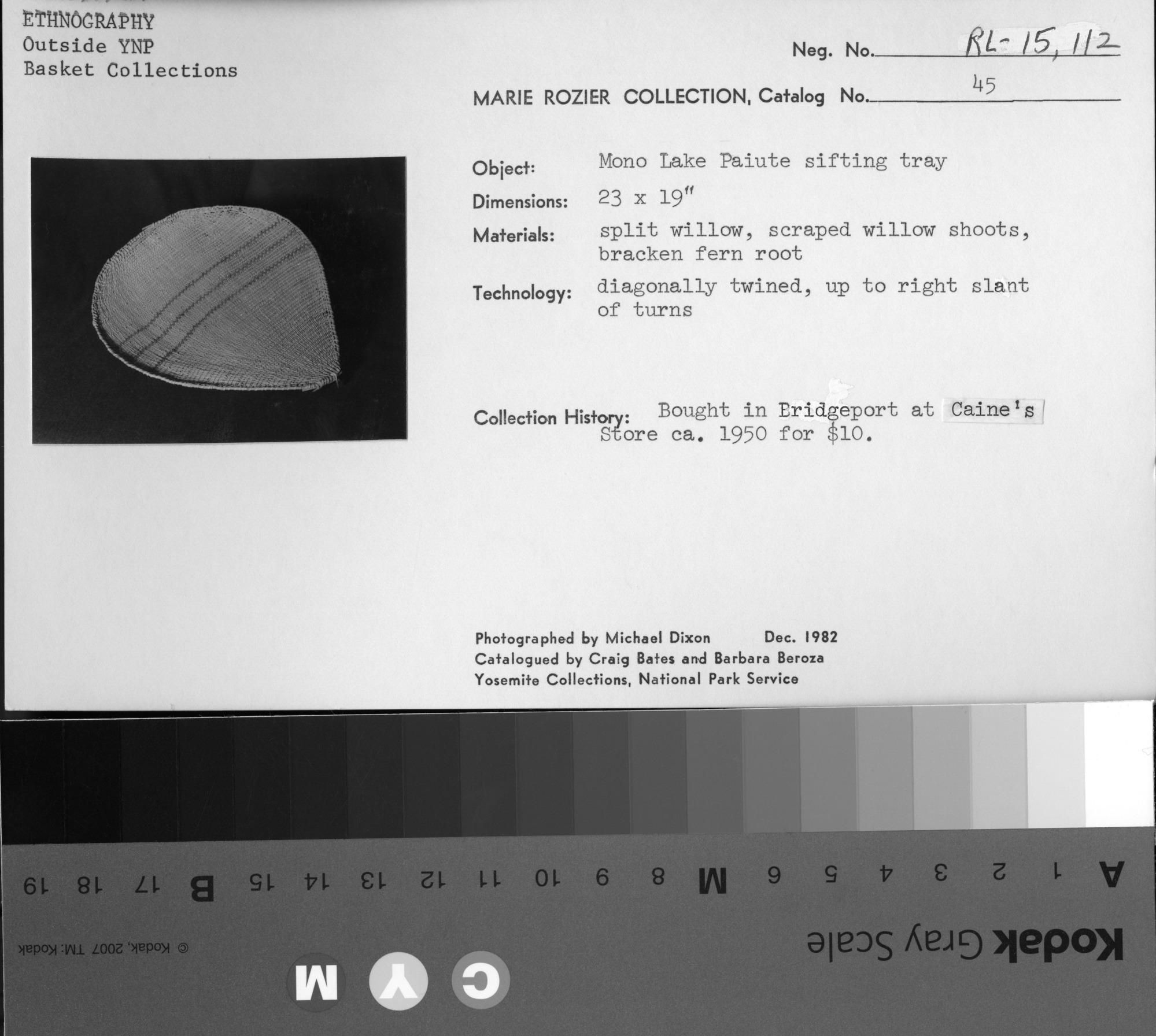 Marie Rozier Collection, Catalog No. 45. Object: Mono Lake Paiute sifting tray. Dimensions: 23 x 19". Materials: split willow, scraped willow shoots, bracken fern root. Technology: diagonally twined, up to right slant of turns. Collection History: Bought in Bridgeport at Caine's Store ca. 1950 for $10. Photographed by Michael Dixon, Dec. 1982. Catalogued by Craig Bates and Barbara Beroza. Yosemite Collections, National Park Service.