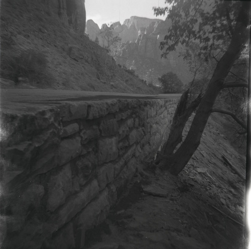 Completed rock retaining wall alongside road at the Zion-Mt. Carmel Highway tunnel.