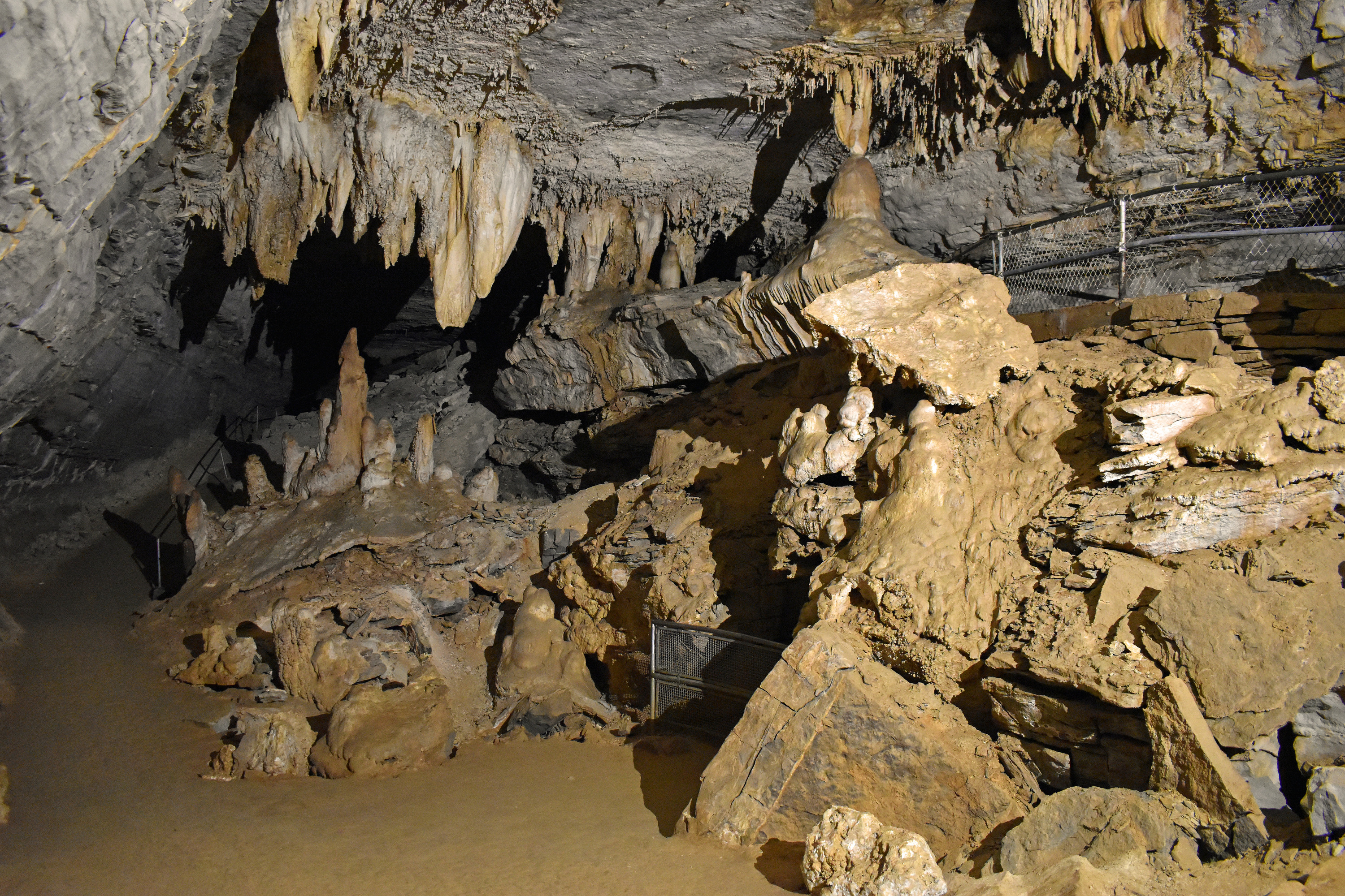A view showing broken down rock, stalactites and stalagmites. 