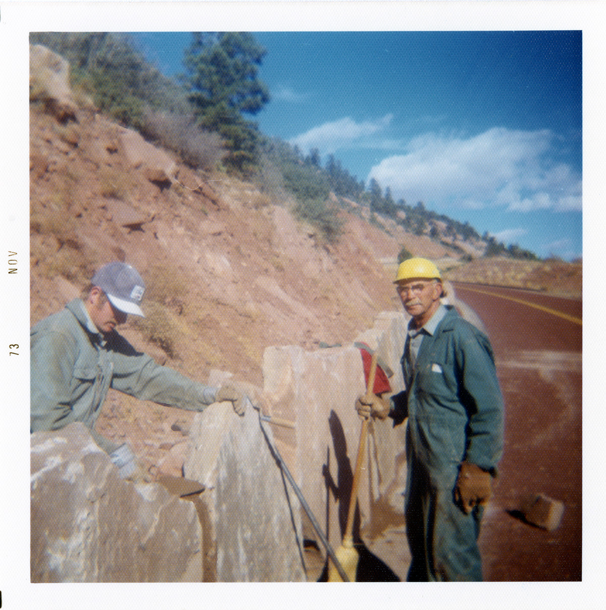 Men constructing the slide control wall along Kolob Canyon Road.