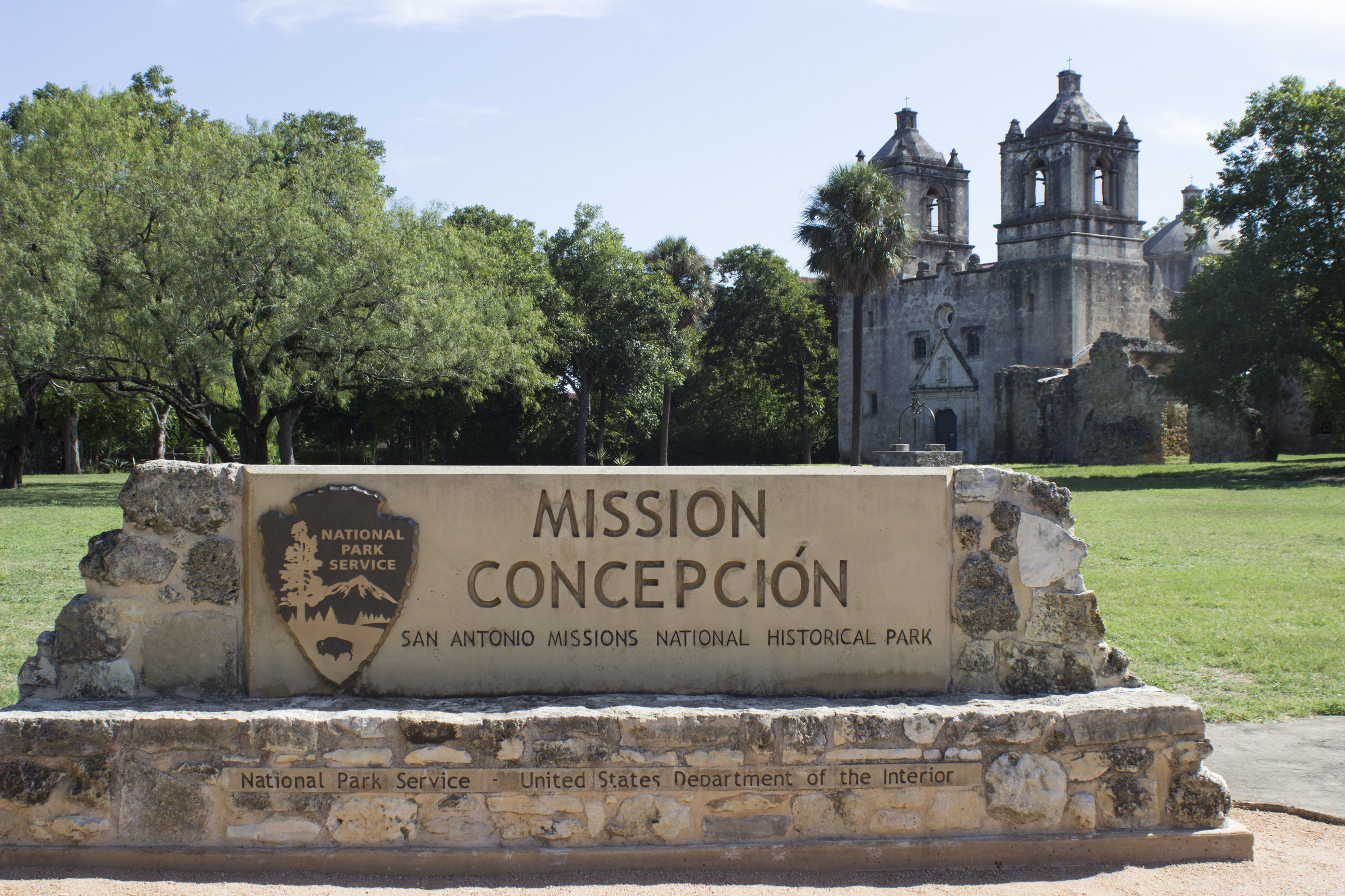 National park sign in front of Mission Concepcion church