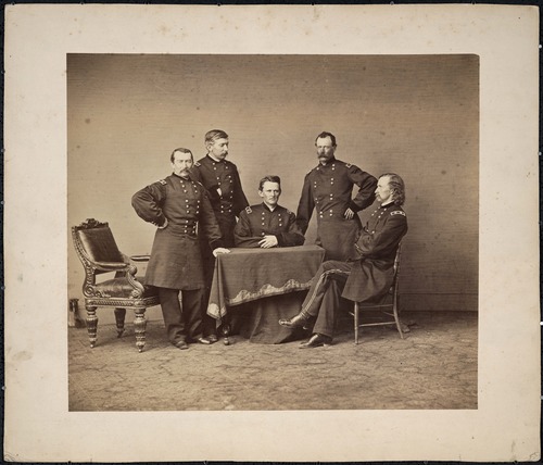 General P.H. Sheridan, Lewis Merritt, George A. Custer, James Forsyth, and Thomas Devin Seated Around an Empty Table