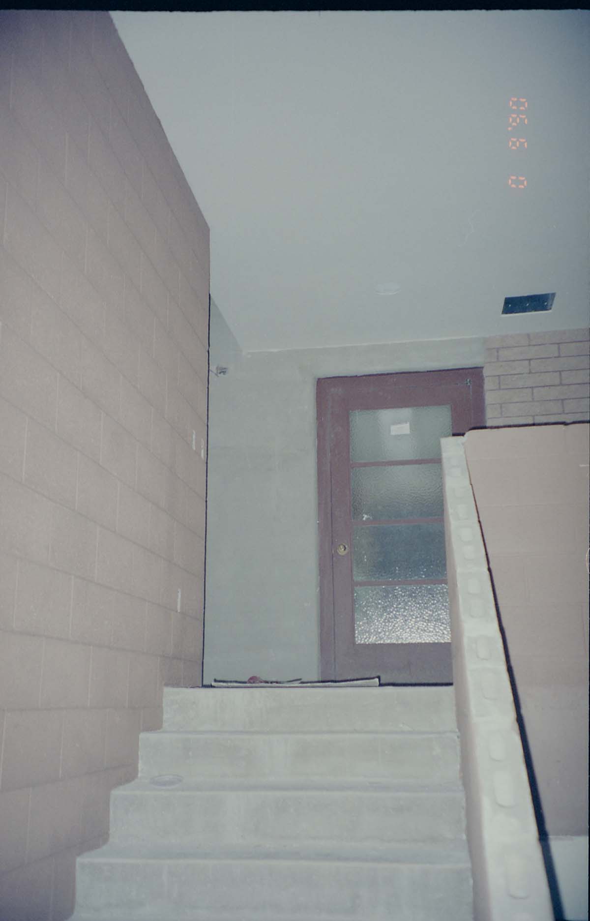 Park Headquarters Renovation: stairs to door for northeast hallway, view from lower landing.