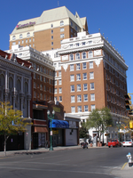 A large building in the middle of the street.