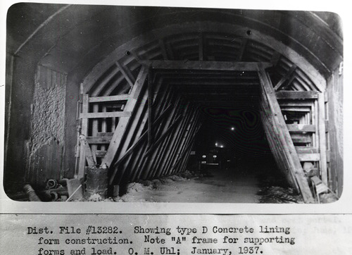 Type D lining form construction. A frame for supporting forms and load in long tunnel, supplemental construction - Zion Mt Carmel Highway.