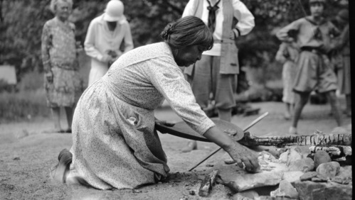 Making acorn cookies. Basket in Yosemite Museum c. 1930's.