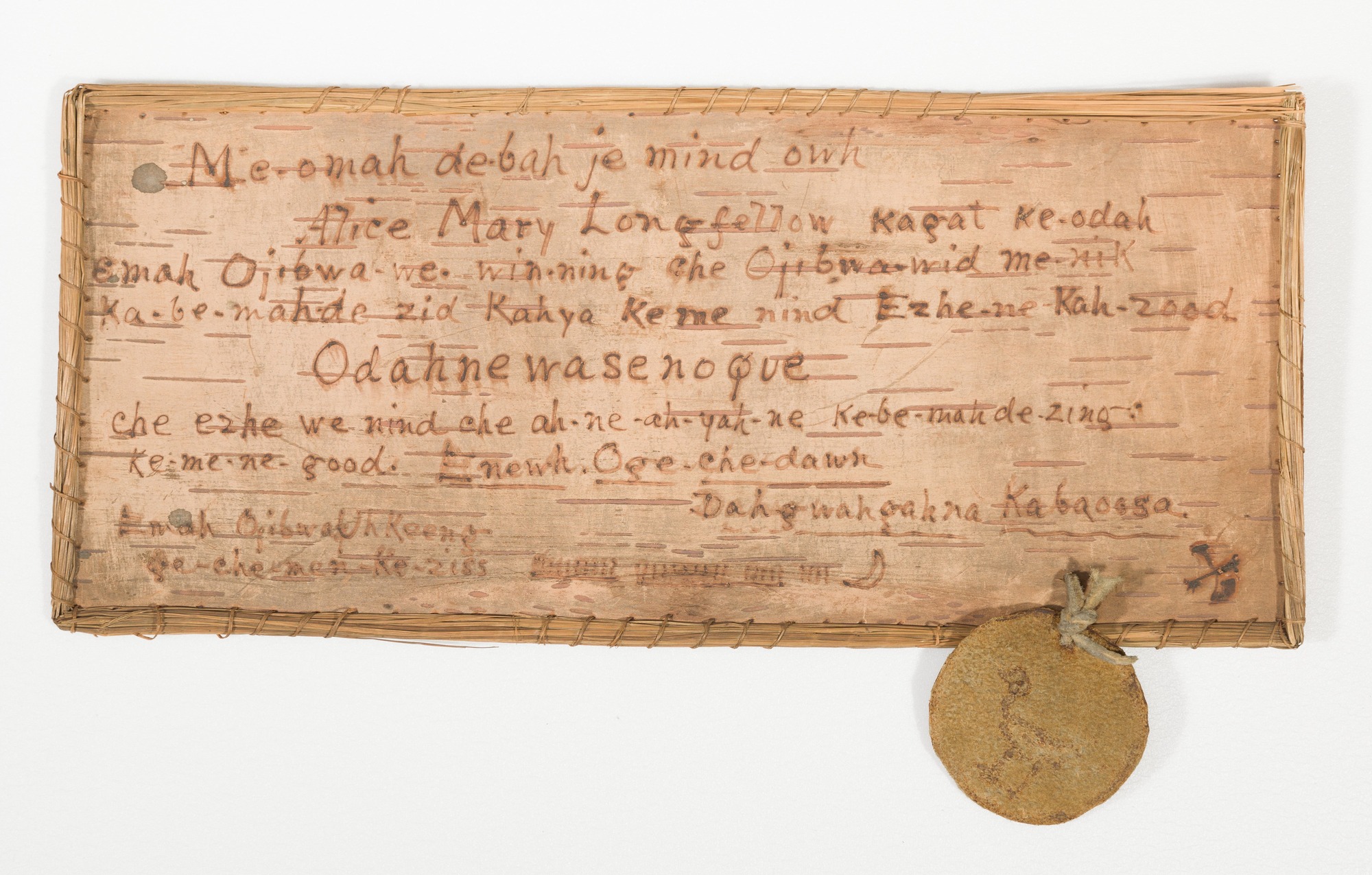 Birchbark certificate with adoptive name for Alice Mary Longfellow in Anishinaabemowin.