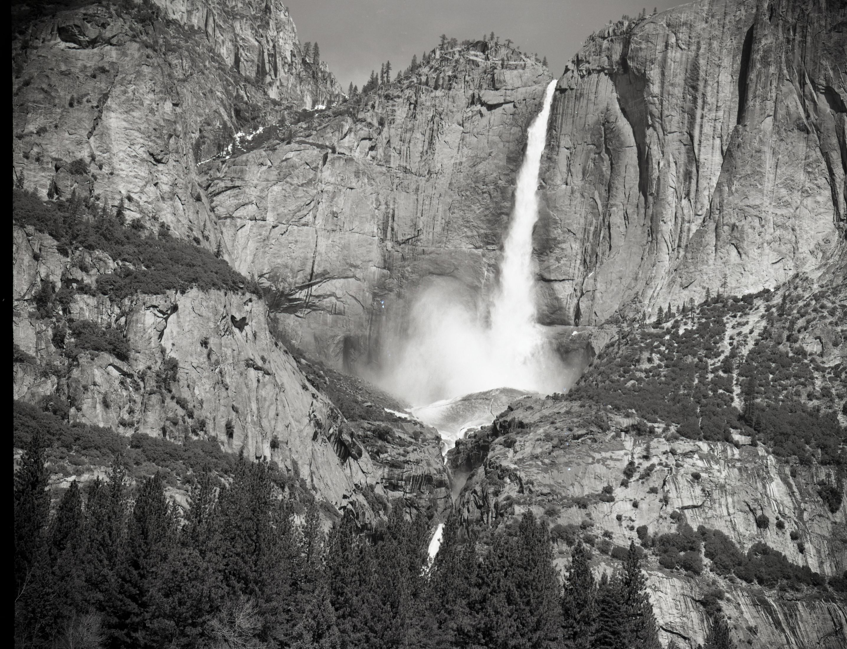 Yosemite Falls. Upper fall from roadside west of Chapel. Record of snow cone demise.