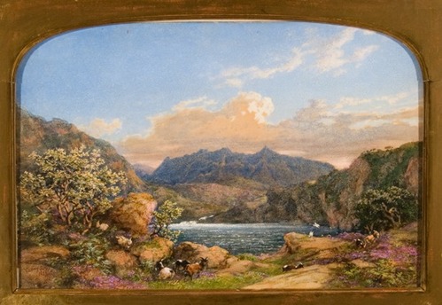 Watercolor of landscape with mountains in distance, water in mid-ground, and rocky shore with several goats in foreground