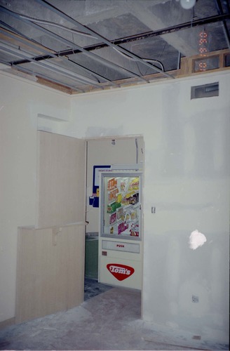 Park Headquarters Renovation: south corner office, lower level. Vending machine visible in open doorway.