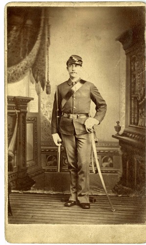 Captain John McGuire in Uniform Standing at 'Carry Arms' Position