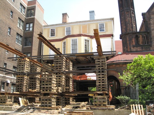 Hamilton Grange National Monument yesterday made a big step forward on its historic journey to St. Nicholas Park. The Grange was rolled over a special railing system onto Convent Avenue. Wolfe House & Building Movers of Pennsylvania then began the process of lowering the house from 38 feet in the air back down to street level at about 3 p.m. The lowering of the home is expected to take two days, after which it will be placed on dollies for the move down 141st Street and into St. Nicholas Park on Saturday, June 7.