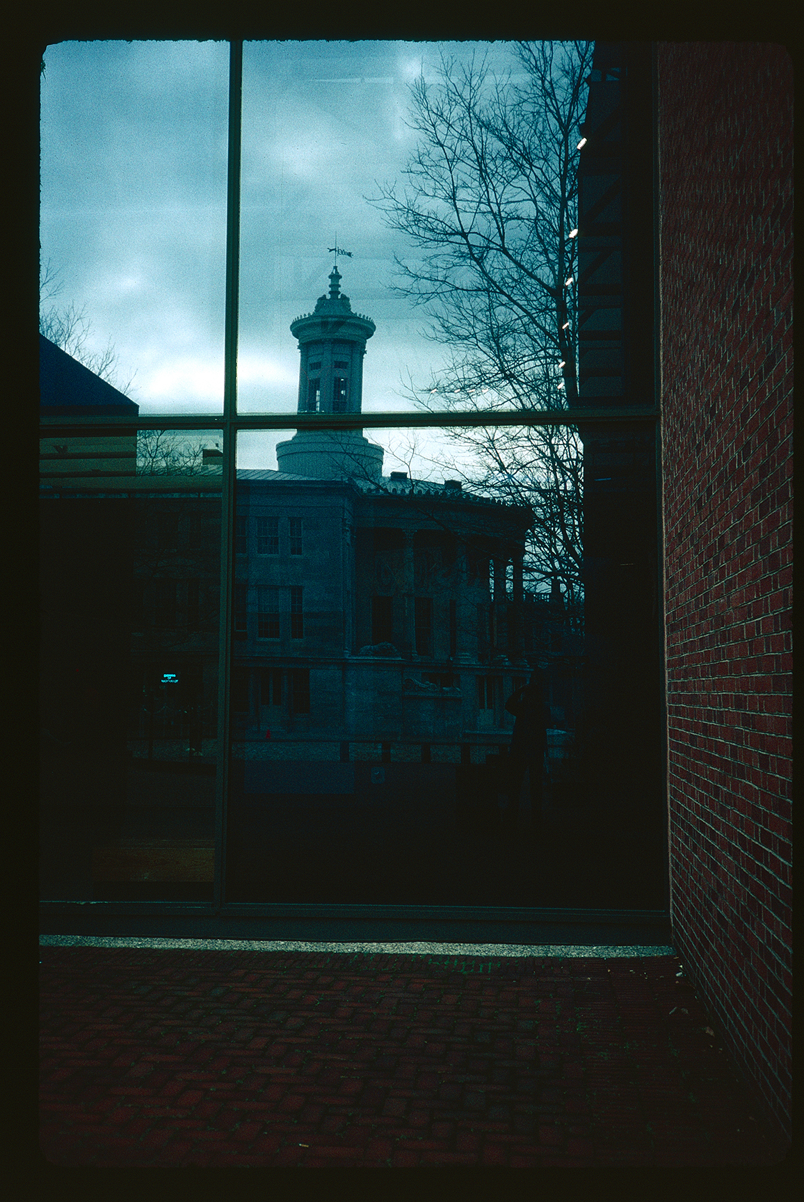 Merchant's Exchange reflected by Visitor Center