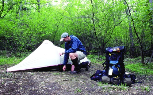 A backcountry camper prepares his campsite in Shenandoah National Park.