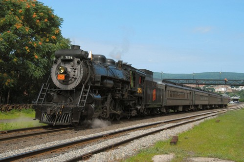 The amount of smoke a steam locomotive produces depends on how hard the engine is working, the skill of the fireman and engineer, and the quality of the coal. A clean stack (little or no smoke) means the steam locomotive is running efficiently.