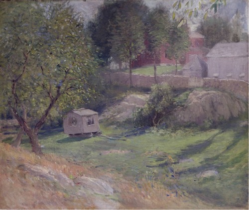 A grassy hillside with a small wooden house on stilts with trees in the background.