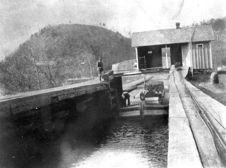 Once inside the lock the gates would be shut and the boat raised (as in this case) or lowered to the next level. This photograph shows Hoag’s Lock near Neversink, northeast of Port Jervis. This boat is loaded with coal and traveling towards Rondout.