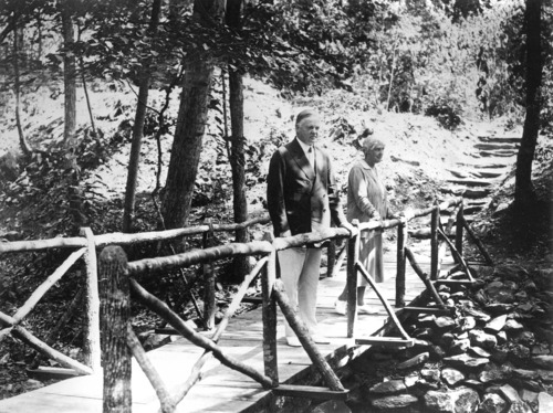 Herbert & Lou Henry Hoover on the foot bridge across Mill Prong.