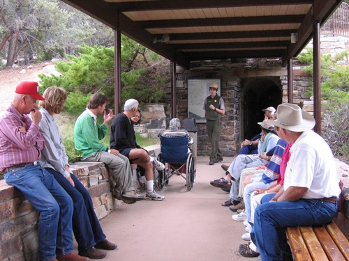 Ranger discusses logistics before entering Lehman Caves with tour group.