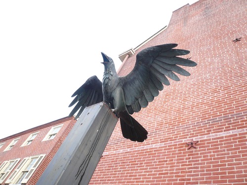 Photo of Raven statue outside the Edgar Allan Poe National Historic Site