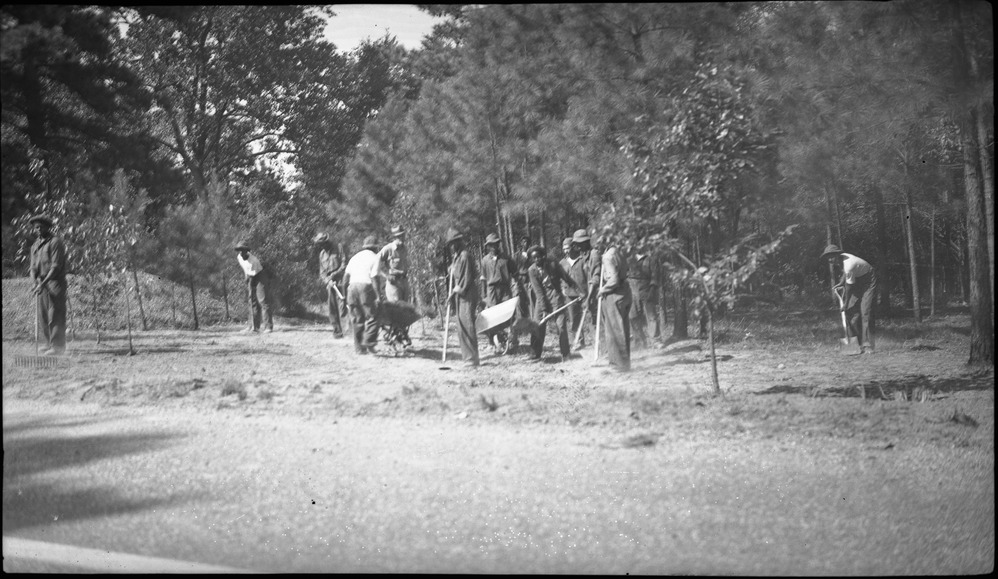 CCC men at work on road.