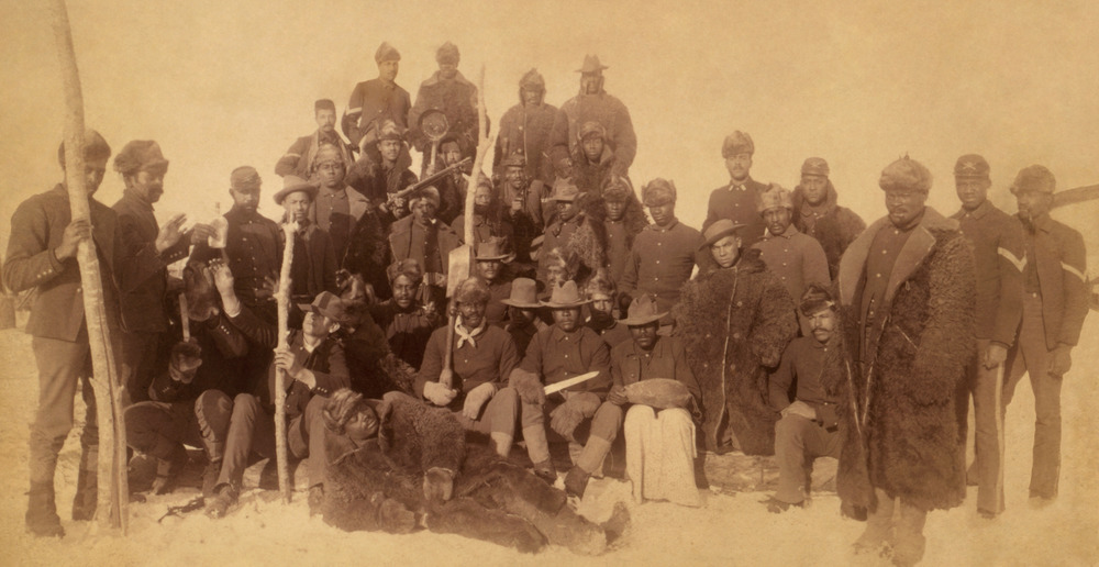 A group of African-American soldiers posing for a photo