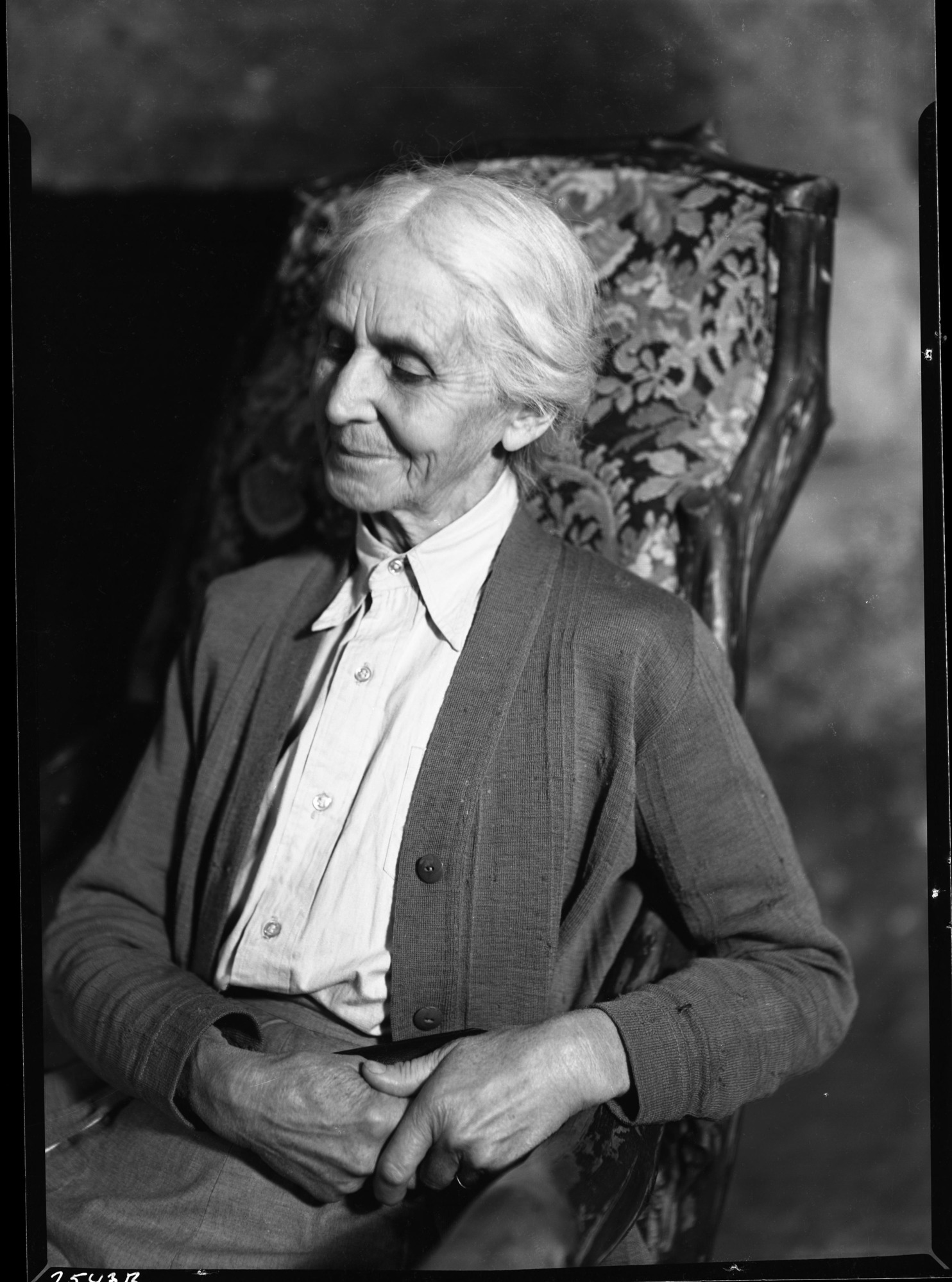 In chair she brought from Mass. for Yosemite Museum.