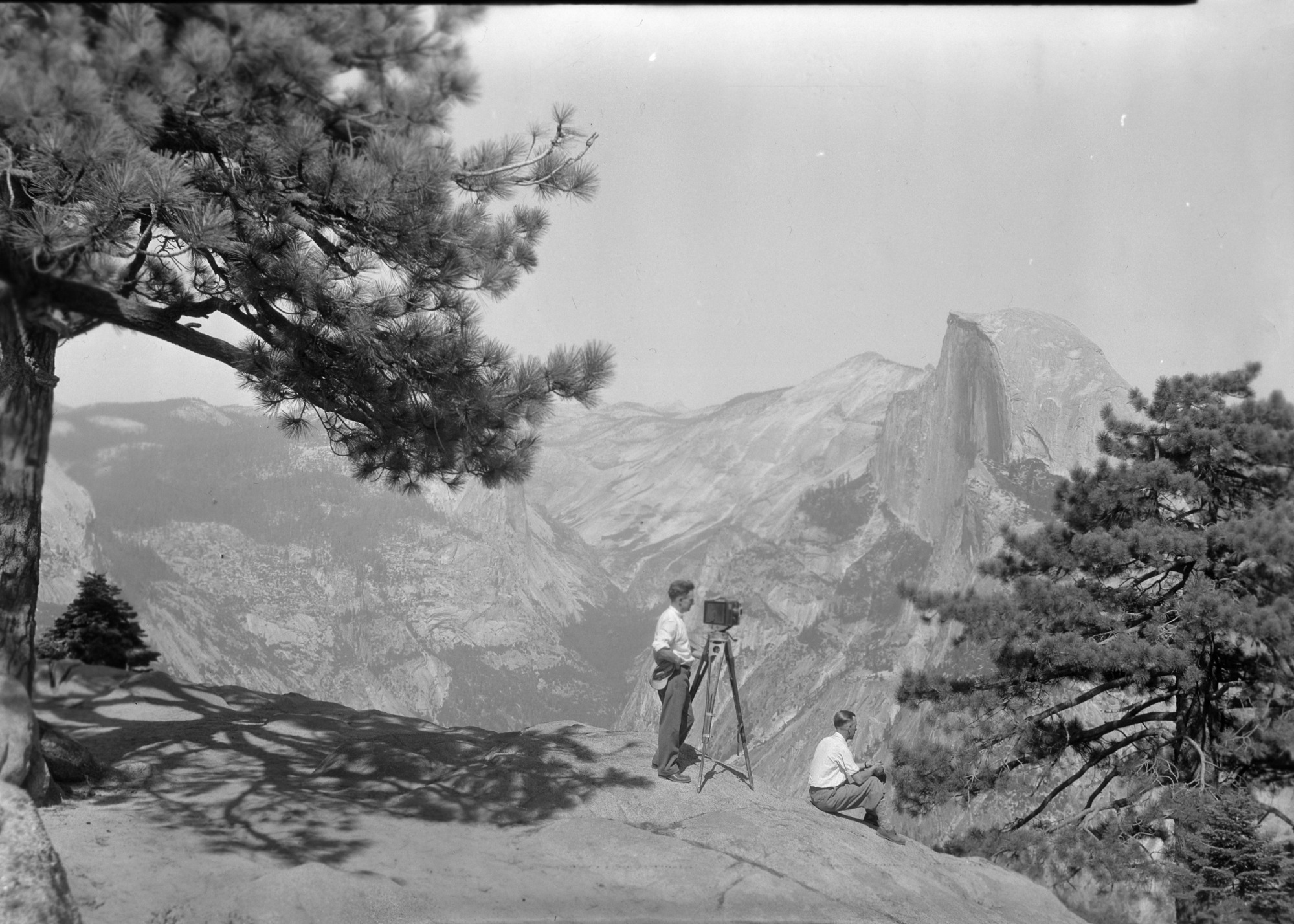 Milton Ayres taking pictures from Glacier Point.