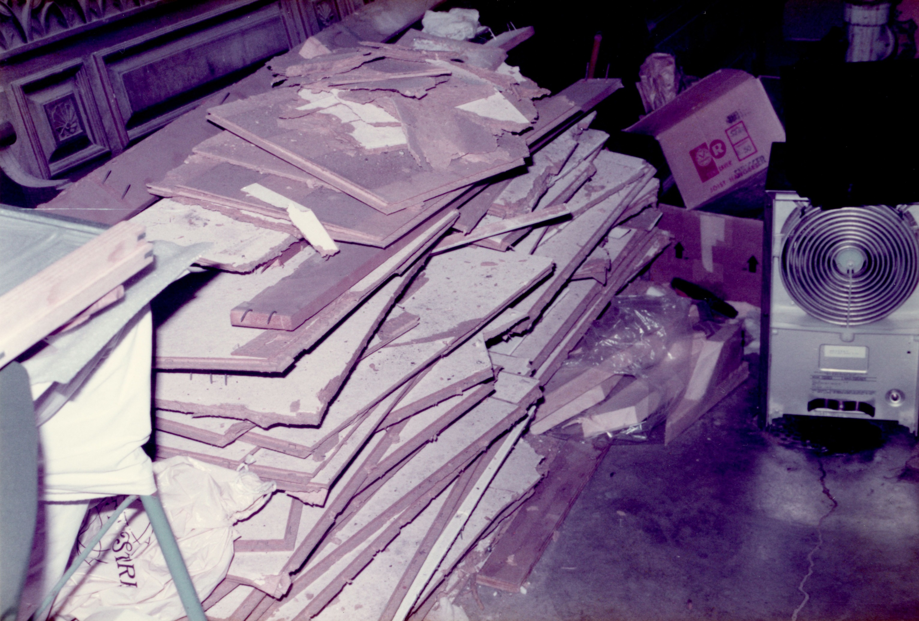 Basement HSTR containing piled up ceiling material