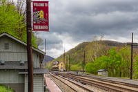 welcome flag and historic depot