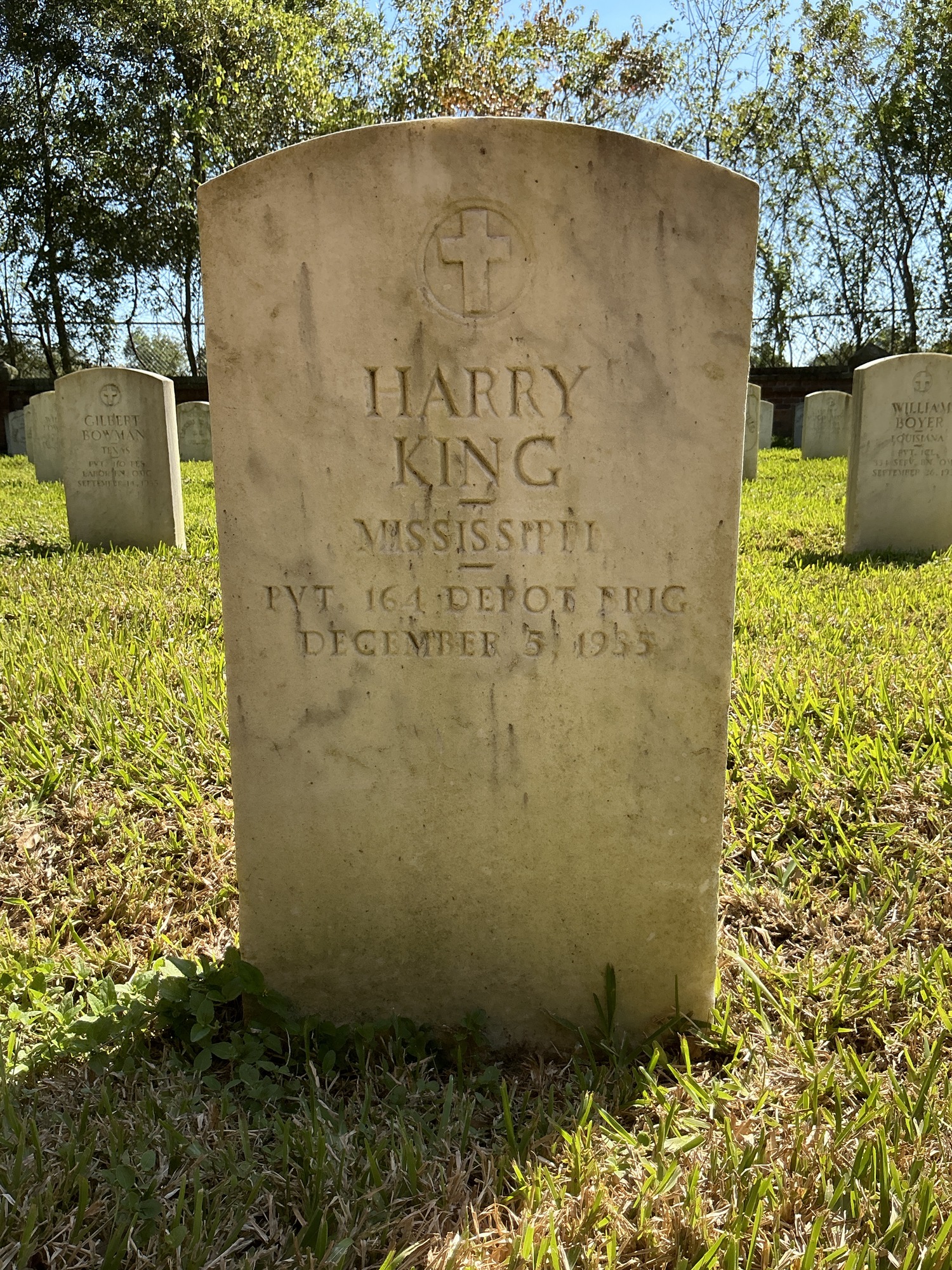 Front of upright marble headstone with flat face.
