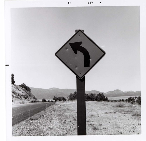 Approaching left curve sign in Kolob Canyon.