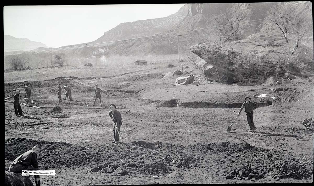 Construction of campfire lecture circle (amphitheater) at Camp Center, Civilian Conservation Corps (CCC) project.