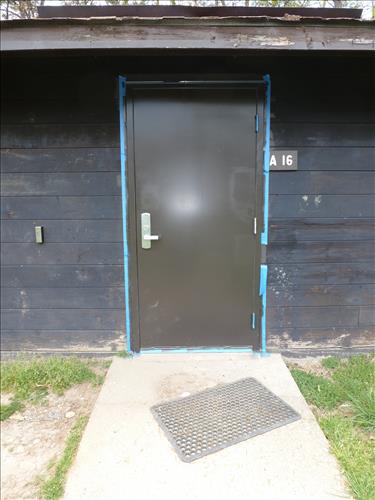 Paint and stain exterior of historic structures in camp 3 and camp 5 at Prince William Forest Park April 2012.
