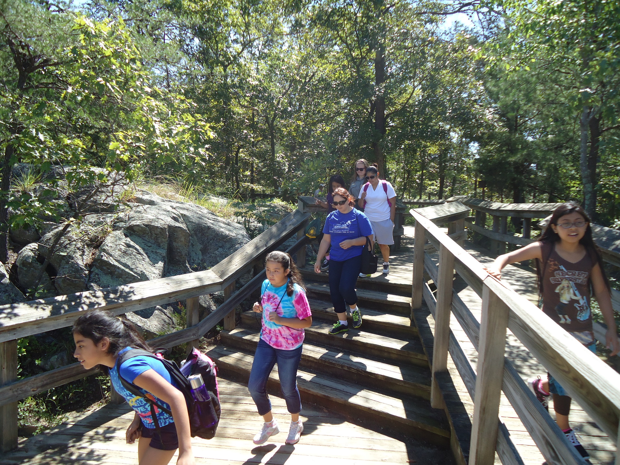 Youth on a hike on the boardwalk.